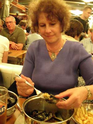 Carol enjoys the mussels at Belgo Centraal