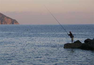 Evening fisherman at Monterosso