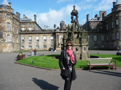 Carol in front of Holyrood House