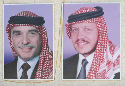 Sign welcoming us to Jordan, displaying pictures of the Jordanian ruling monarchs