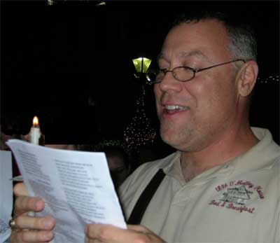 Larry singing Christmas carols at Jackson Square