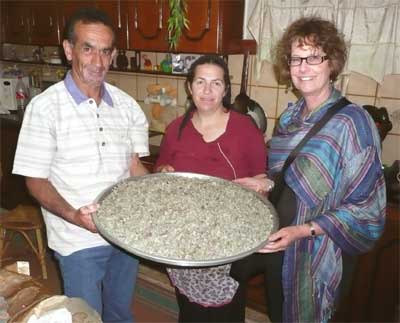 Yusef, Nadia and Carol in their large kitchen in Beit Jann