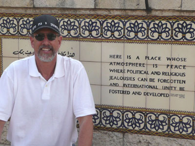 David near a sign at Jerusalem's YMCA