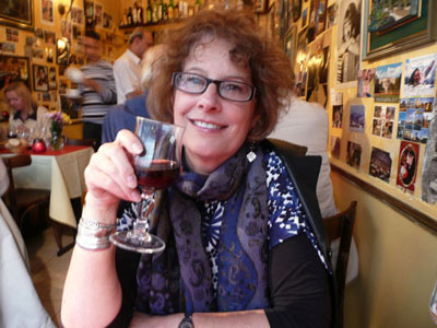 Carol enjoying wine on Rue Mouffetard