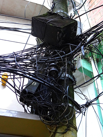 Mess of electrical wires at the Vila Canoas favela