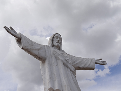 Statue of Jesus high above Cuzco