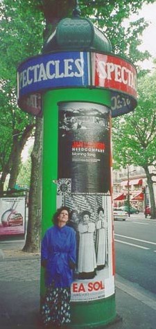 Carol at a Parisian phone booth